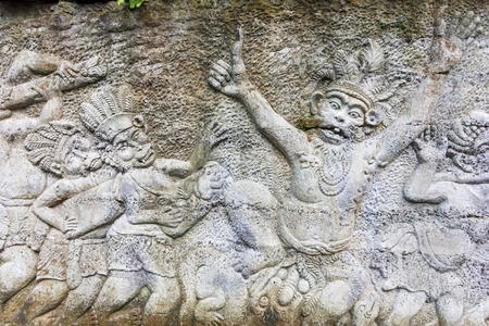 Stone sculptures covered in Ubud Monkey Forest Sanctuary. Bali, Indonesiaの写真素材