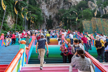 Kuala Lumpur, Malaysia - September 23, 2018: Crowd of people visiting the Batu Caves, a Hinduism...