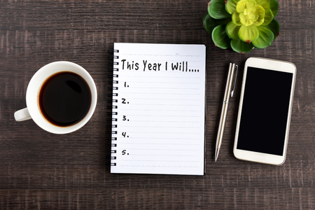 New Year Resolution Concept - This Year I Will Text on Note Pad.の写真素材