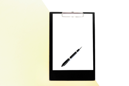 Directly above shot of clipboard on multicolored background.の写真素材