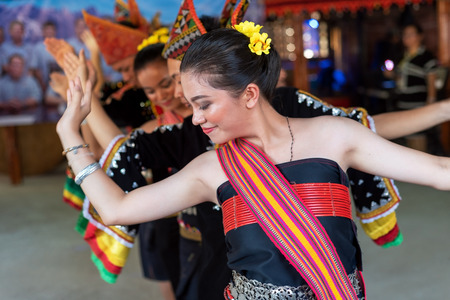 Beautiful young girls from Kota Belud Kadazan Dusun ethnic performed  traditional dance during state level Harvest Festival in KDCA, Kota  Kinabalu,