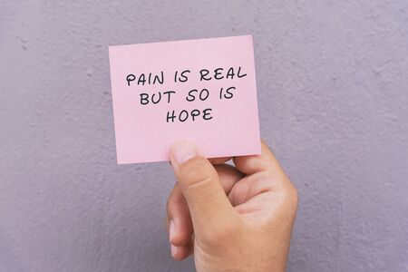 Motivational and inspirational quotes - pain is real but so is hopeの写真素材
