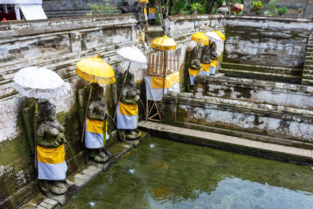 Holy spring water at Goa Gajah temple or also known as Elephant cave in Sukawati district Bali, Indonesiaのeditorial素材