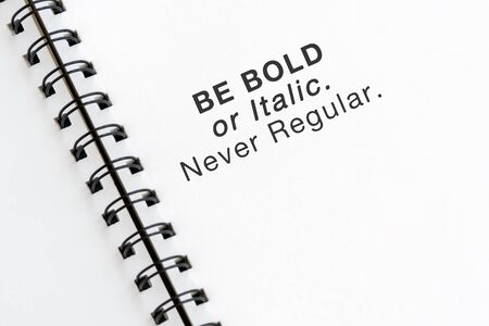 Inspirational quotes text on note pad - Be bold or italic never regular.の写真素材
