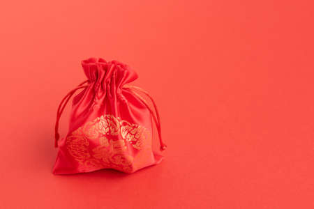 Chinese Small Bag on Red Background - Chinese New Year Conceptの写真素材
