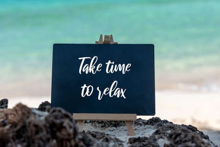 Inspirational quotes - Take time to relax beach backgroundの写真素材