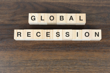 Global recession text on wooden blockの写真素材