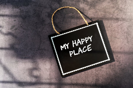 Mini chalkboard with text My Happy Placeの写真素材