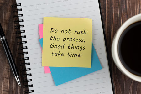 Colorful adhesive note with inspirational text - Do not rush the process, Good Thing take time.
