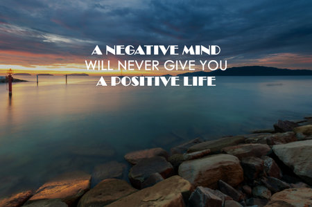 Sunset background with life inspirational quotes - A negative mind will never give you positive lifeの写真素材