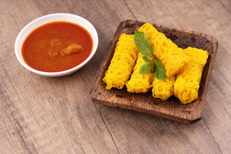 Roti Jala or Net Bread and curry sauceの写真素材