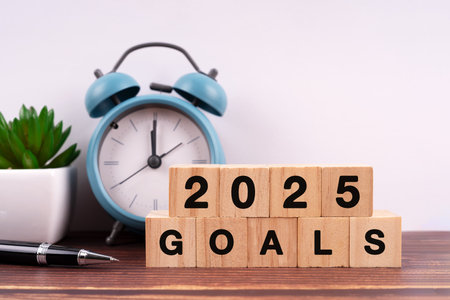 2025 goals text and number engraved on wood blockの写真素材