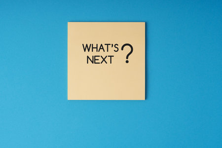 What's next text on adhesive note blue backgroundの写真素材