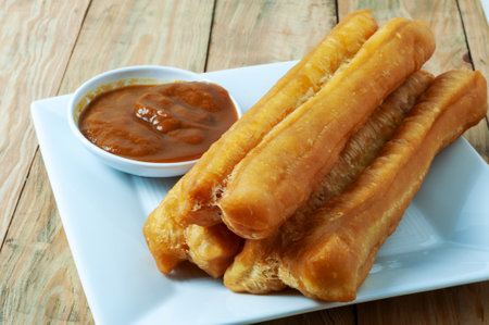 Deep fried Youtiao Chinese fried breadstick and kaya coconut jamの写真素材