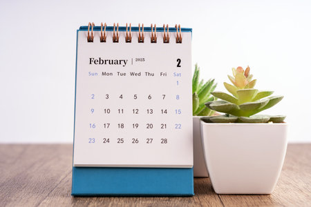 February 2025 desk calendar white backgroundの写真素材