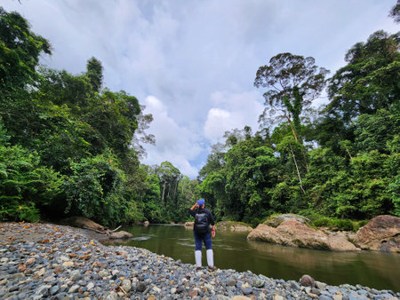 Rear view of woman in Danum riverbank Lahad Datuの写真素材