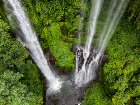 Sekumpul Waterfall, also known as Gerombong Waterfall, is a famous waterfall in Bali, Indonesiaの写真素材