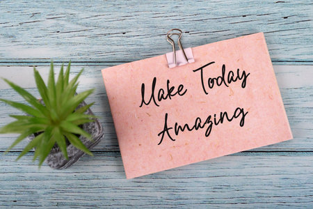 Paper note with inspirational quotes text Make Today Amazing