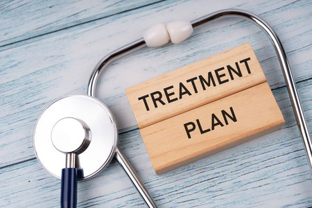Stethoscope and text treatment plan Healthcare and medical concept