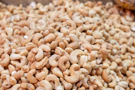 Backround of roasted cashew nuts sold at city marketの写真素材