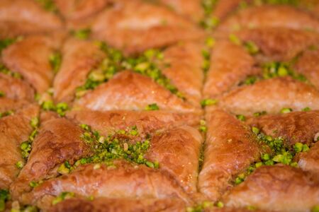 Sweet baklava with honey and pistachio nuts. Selective focusの写真素材