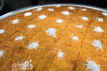 Kanafeh pieces for sale at sweets store in Jordan