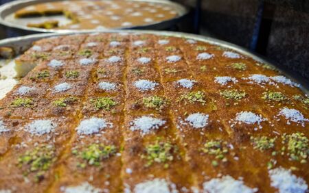 Kanafeh pieces for sale at sweets store in Jordanの写真素材