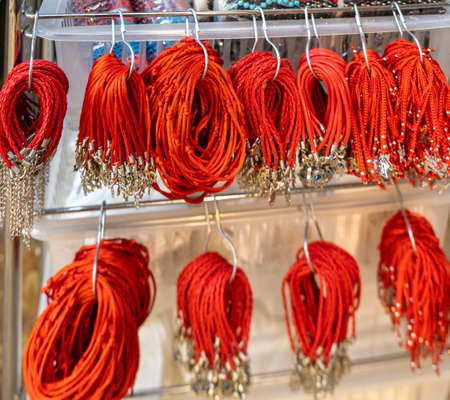 Red threads or strings for sale at Old Jerusalem street market. Israel