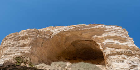 Small cave at Ein Avdat - a canyon in the Negev Desert of Israelの写真素材