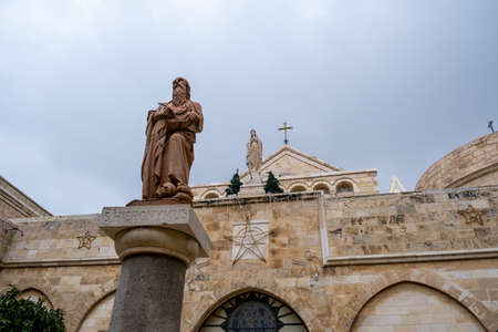 The statue of Jesus in front of the Church of the Annunciationの写真素材