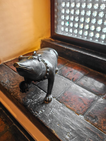 The bronze statue of a rat holds a nut. The rat is Ganesha's animal. 19th centuryの写真素材