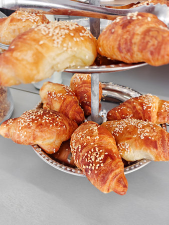 Sesame croissants on a small cafe standの写真素材