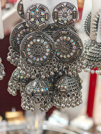 Souvenir oriental-style decorated earrings are sold at an old market in Dubai. United Arab Emiratesの写真素材