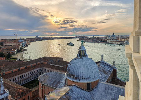 Aerial view of sunset in Venice from the Cathedral San Giorgio Maggiore bell tower, Venice. Italyの写真素材
