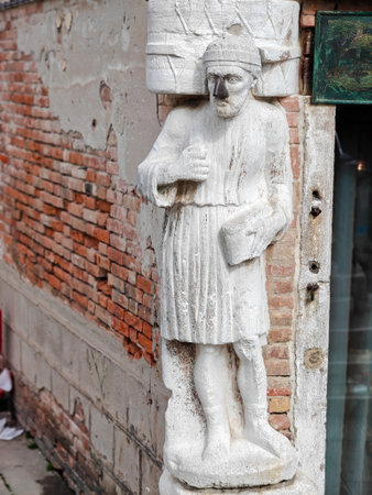 Sior Rioba statue with iron nose, Cannaregio area, Venice. Italyの写真素材