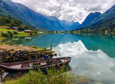 Amazing sky reflecting in Lake Floen in Olden in Nordfjord, Norway