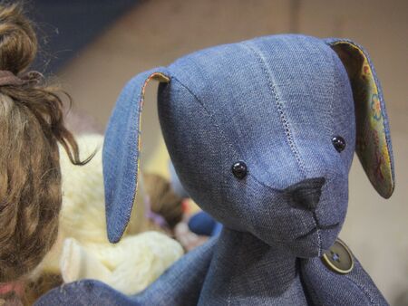Old vintage blue textile dog toy doll