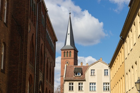 Historical buildings and the steeple of St  Lawrence Church  St  Laurentius  in the old town of Berlin-Koepenickの写真素材