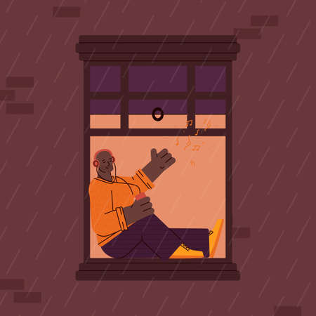 Cartoon man sitting in apartment window sill listening to music on headphones and smiling on rainy night. Flat vector illustration of building neighbor character.のイラスト素材
