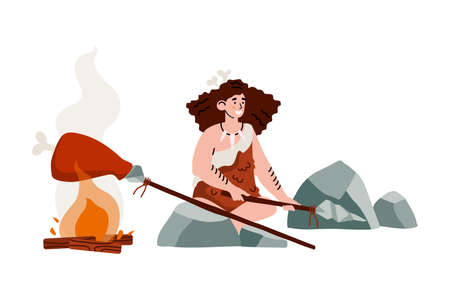 Primitive ancient cave woman stone age sitting on rocks and cook meat on fire.の写真素材