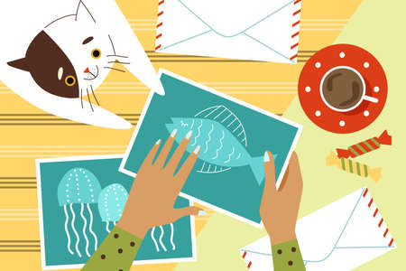 Desktop with hands packing postcards in envelopes, flat vector illustration.