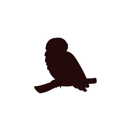 Black silhouette of polar owl sitting on branch flat styleのイラスト素材