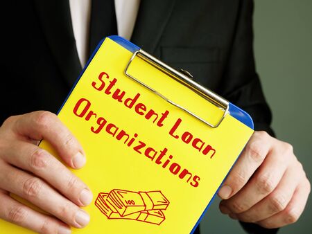 Business concept meaning Student Loan Organizations with inscription on the piece of paper.の写真素材