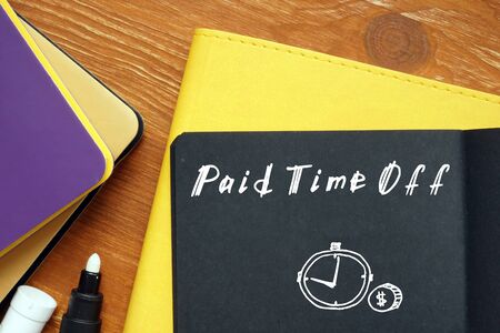 Business concept meaning Paid Time Off with sign on the sheet.の写真素材