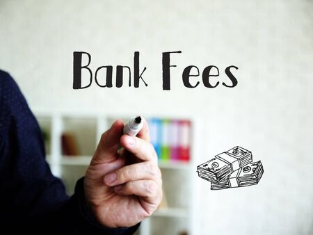 Financial concept meaning Bank Fees with inscription on the sheet.の写真素材