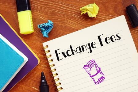 Business concept meaning Exchange Fees with sign on the piece of paper.の写真素材