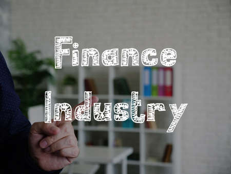 Business concept meaning Finance Industry with phrase on the sheet.の写真素材