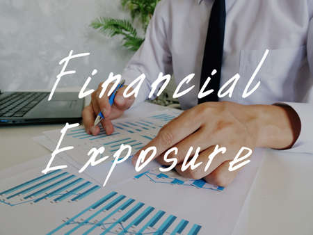 Conceptual photo about Financial Exposure with handwritten text.の写真素材