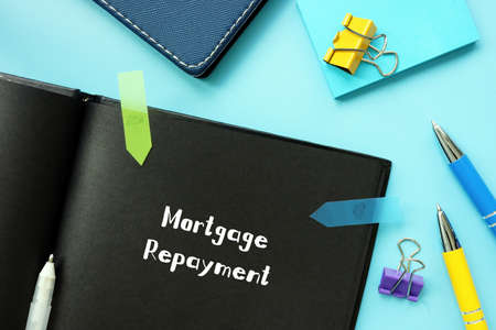 Financial concept about Mortgage Repayment with inscription on the piece of paper.