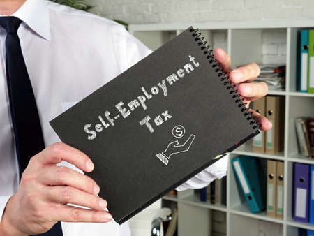 Financial concept about Self-Employment Tax with phrase on the piece of paper.の写真素材